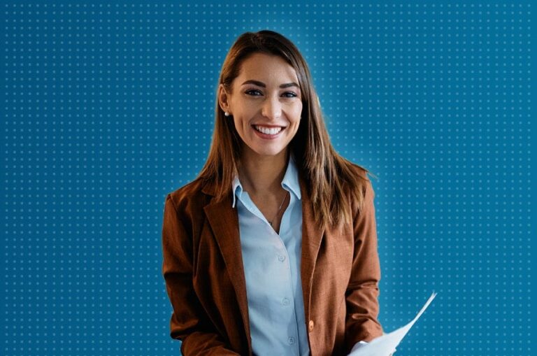 Woman smiling, holding documents